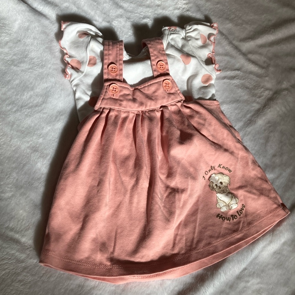 pink dress with a white with pink dots